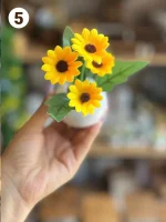 گل و گلدان های نقلی بابونه و آفتابگردان